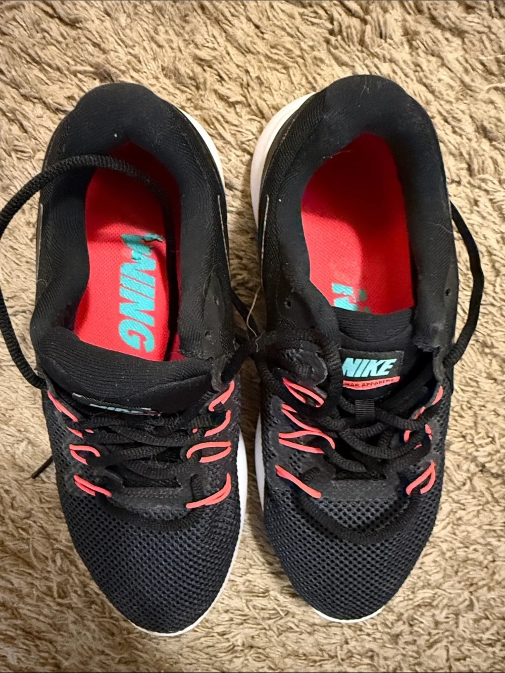 Nike Black Running Shoes with Pink and White Accents